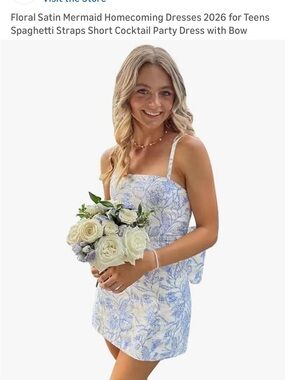 New Floral Spaghetti Strap Mini Dress - Blue & White. Removable bow on back.